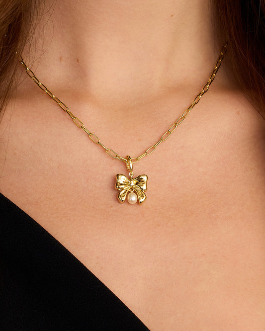 Charm Parker de perla con lazo