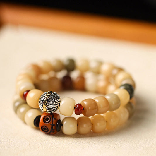 Pulsera de sabiduría Om Mani Padme Hum con semillas de Bodhi naturales de Buda y el Señor del Bosque Cadáver