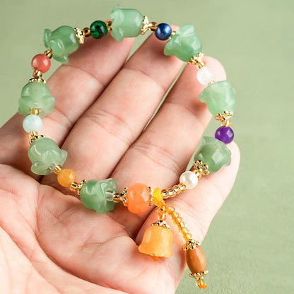 Pulsera de la suerte con flor de magnolia y aventurina verde de Buddha Stones 