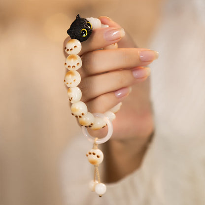 Pulsera de la paz con semillas de bodhi naturales de Buda, sándalo rojo, gato de la suerte y pata encantadora 