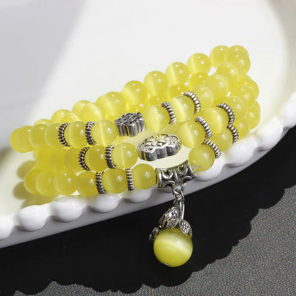 Pulsera triple vuelta con soporte PiXiu de ojo de gato y piedras de Buda