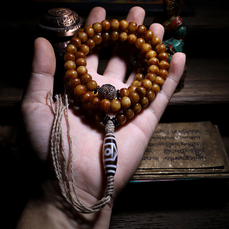 Pulsera tibetana de 108 cuentas Mala de hueso de yak con tres ojos de Dzi y piedras de Buda para alejar los malos espíritus.