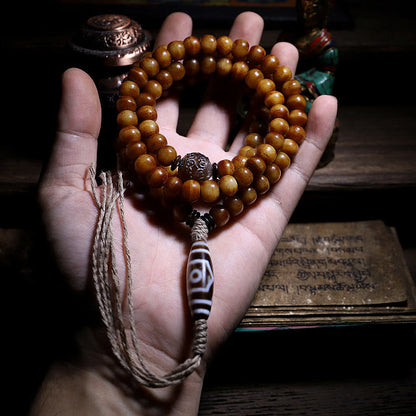 Pulsera tibetana de 108 cuentas Mala de hueso de yak con tres ojos de Dzi y piedras de Buda para alejar los malos espíritus.