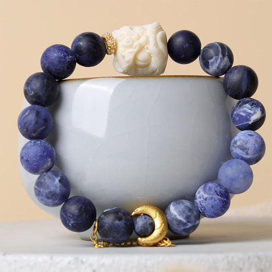 Pulsera de armonía de luna creciente con león danzante, fruta, sodalita y marfil con piedras de Buda