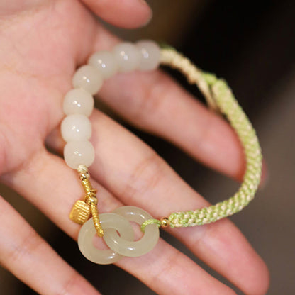 Pulsera trenzada con cuentas de jade hetiano natural de Buda y doble hebilla de paz con carácter Fu 