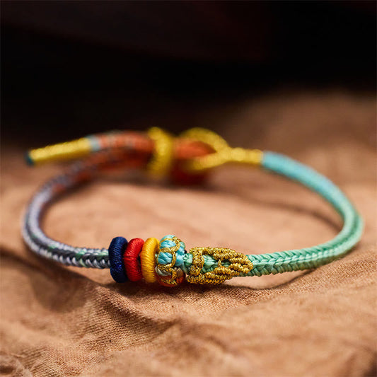 Pulsera hecha a mano con nudo de la paz de ocho hilos y piedras de Buda