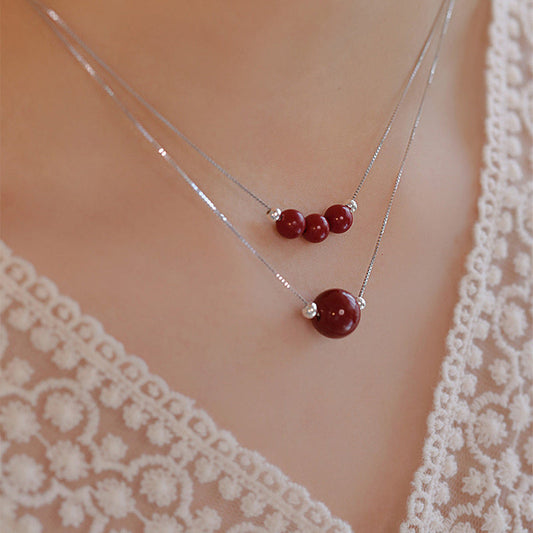 Collar con colgante de bendición de la calma con cuentas de cinabrio de Buda en plata de ley 925