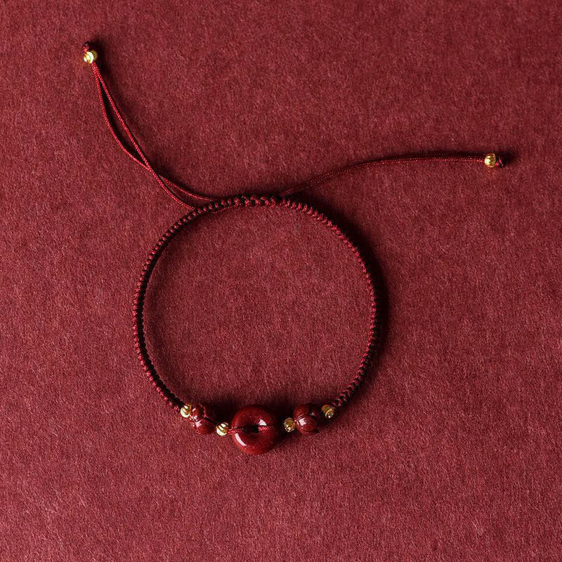 Pulsera trenzada con bendición de paz y cinabrio de loto hecha a mano con piedras de Buda