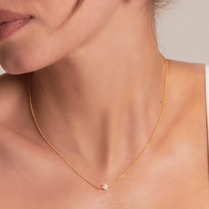 Conjunto de regalo de gargantilla y pulsera con una perla dorada