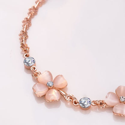 Pulsera de cadena de amor con trébol de cuatro hojas y cristales rosas de Buddha Stones