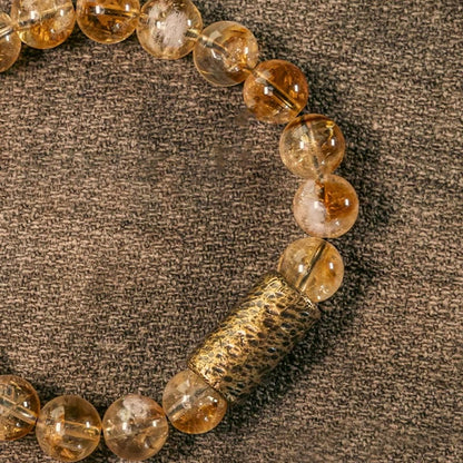 Pulsera protectora de cuentas de latón con cristales de citrino natural de Buddha Stones 