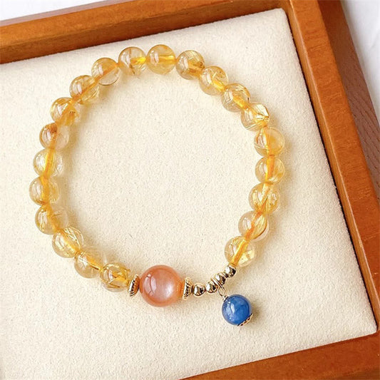 Pulsera de riqueza de cianita con piedra solar de cuarzo rutilado y oro natural de Buddha Stones