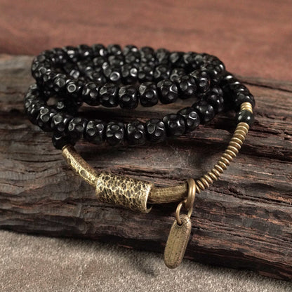 Pulsera de triple vuelta de cobre con cáscara de coco retro de Buddha Stones 
