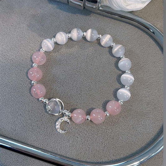 Pulsera con dije de luna de amor y cristal rosa ojo de gato natural de Buddha Stones