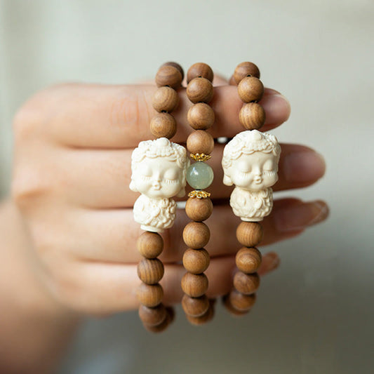 Pulsera protectora de piedras de Buda, sándalo, jade hetiano, marfil y fruta de Tara verde 