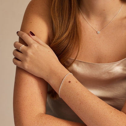 Silbernes Tennisarmband und Ohrstecker im Princess-Diamant-Stil