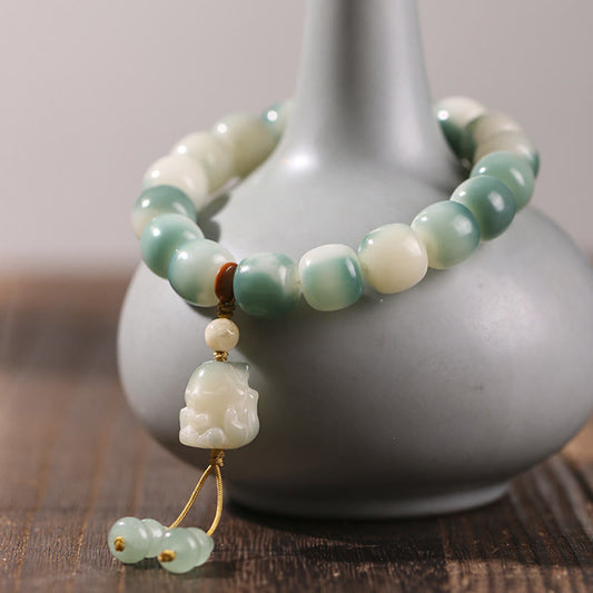 Pulsera de la paz con piedras de Buda, semillas de Bodhi, zorro de nueve colas, garra de gato, piña y garra