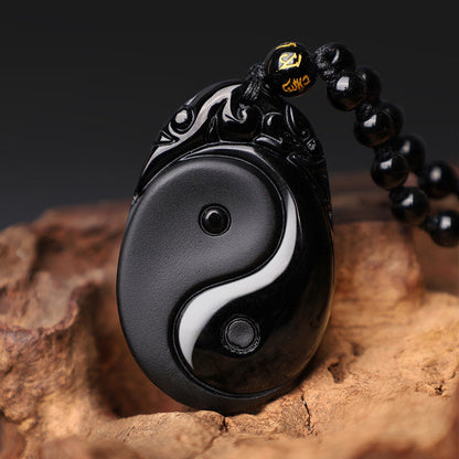 Collar con colgante de obsidiana negra natural con piedras de Buda que simboliza la fuerza y ​​el cumplimiento del Yin Yang. 
