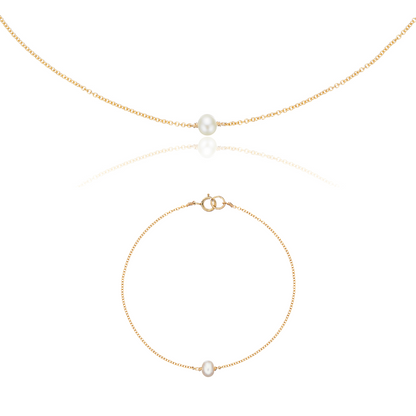 Conjunto de regalo de gargantilla y pulsera con una perla dorada