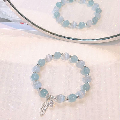 Pulsera con dije de estrella y pluma curativa de ojo de gato y aguamarina en plata de ley 925 con piedras de Buda 