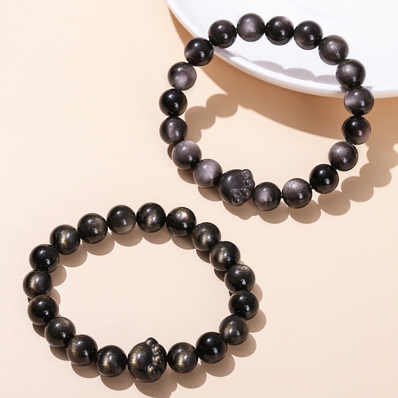 Pulsera de riqueza con garra de gato y obsidiana con brillo dorado natural y obsidiana con brillo plateado. 