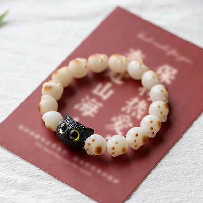 Pulsera de la paz con semillas de bodhi naturales de Buda, sándalo rojo, gato de la suerte y pata encantadora 