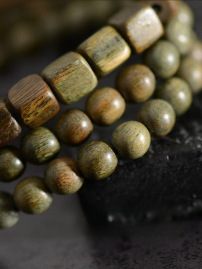 Green Sandalwood Agate Two Eyed Dzi Bead Bracelet