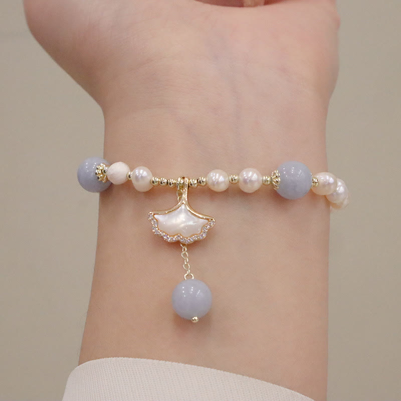 Pulsera con dije de mariposa, hoja de ginkgo y perla de aguamarina natural de Buda 