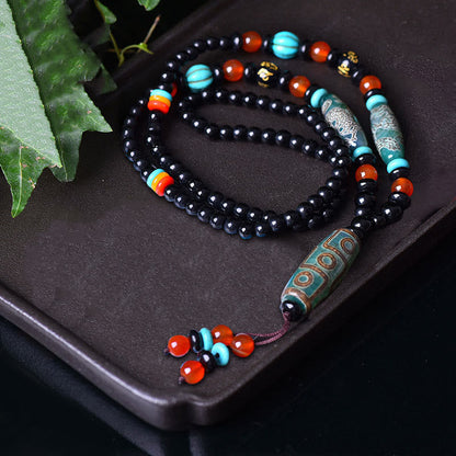 Collar con colgante de piedra de Buda tibetano con cuentas Dzi de nueve ojos y diseño de dragón, protección Om Mani Padme Hum