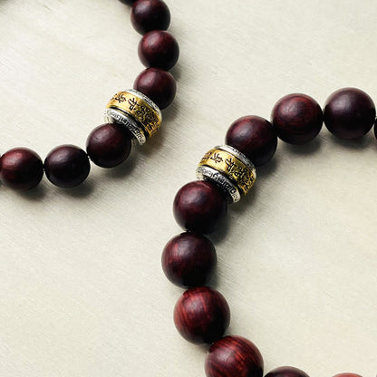 Pulsera protectora con amuleto de sándalo rojo y hojas pequeñas de Buda 