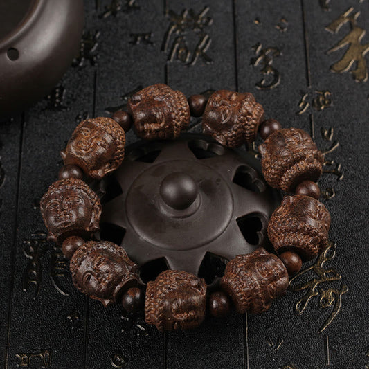 Buddha Stones Adlerholz Buddha geschnitzt Ruhe Armband 
