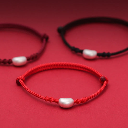 Pulsera trenzada hecha a mano con piedras de Buda en plata de ley 999 con diseño de frijol y conexión con la suerte 