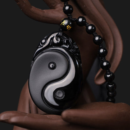 Collar con colgante de obsidiana negra natural con piedras de Buda que simboliza la fuerza y ​​el cumplimiento del Yin Yang. 
