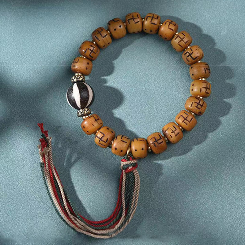 Buddha-Steine, natürliches tibetisches Kamelknochen-Hakenkreuz-Dzi-Perlen-Shankha-Buddha-Charm, Kirtimukha-Glücksschutz-Quastenarmband