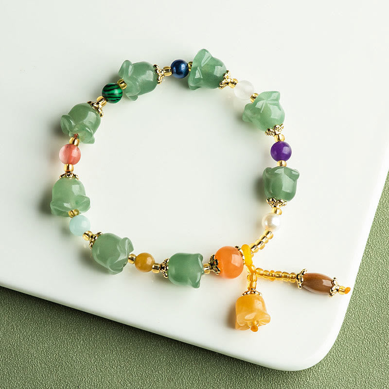 Pulsera de la suerte con flor de magnolia y aventurina verde de Buddha Stones 