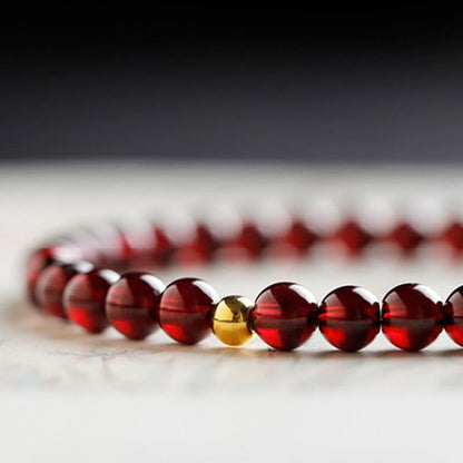 Buddha Stones 999 Gold Koi Fisch Natur Granat Schutzarmband