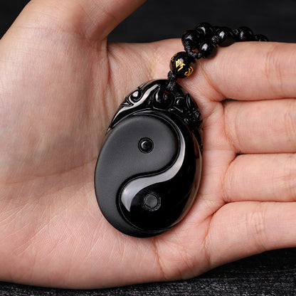 Collar con colgante de obsidiana negra natural con piedras de Buda que simboliza la fuerza y ​​el cumplimiento del Yin Yang. 