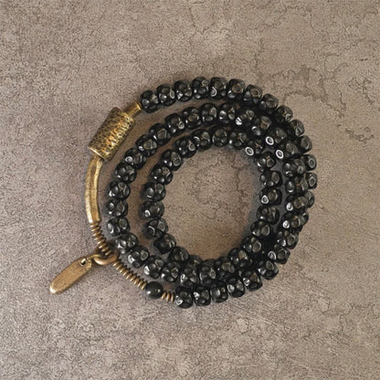 Pulsera de triple vuelta de cobre con cáscara de coco retro de Buddha Stones 