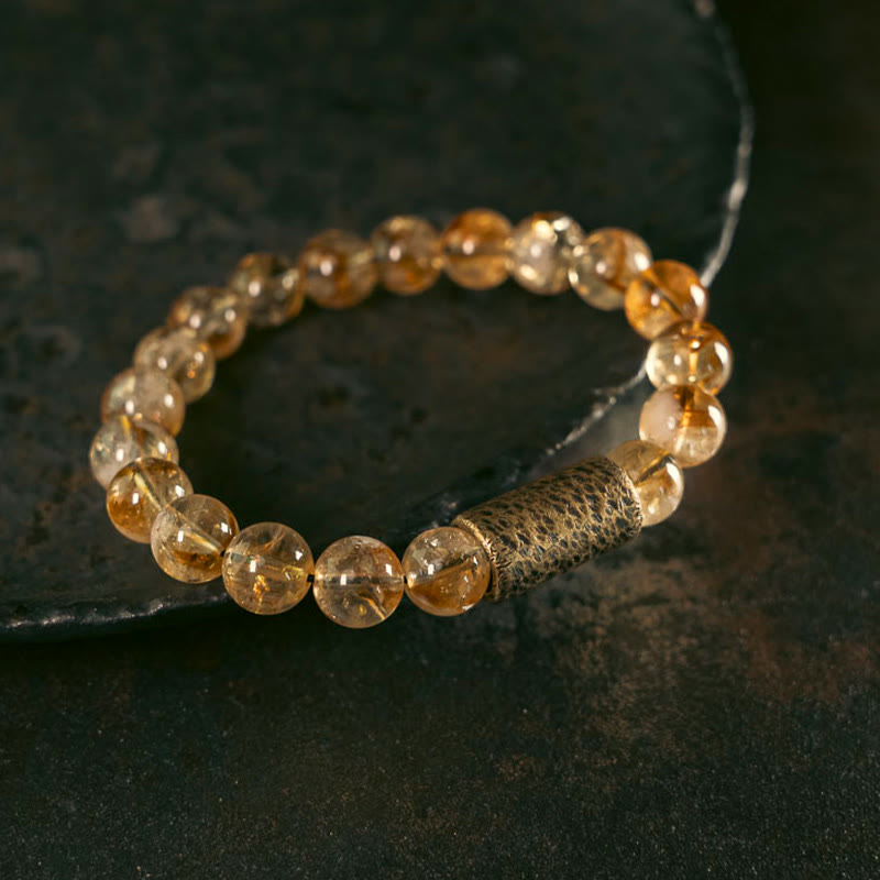 Pulsera protectora de cuentas de latón con cristales de citrino natural de Buddha Stones 