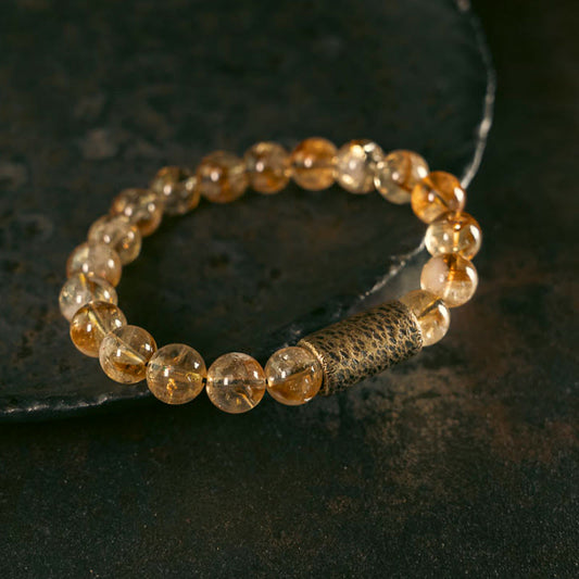 Pulsera protectora de cuentas de latón con cristales de citrino natural de Buddha Stones 
