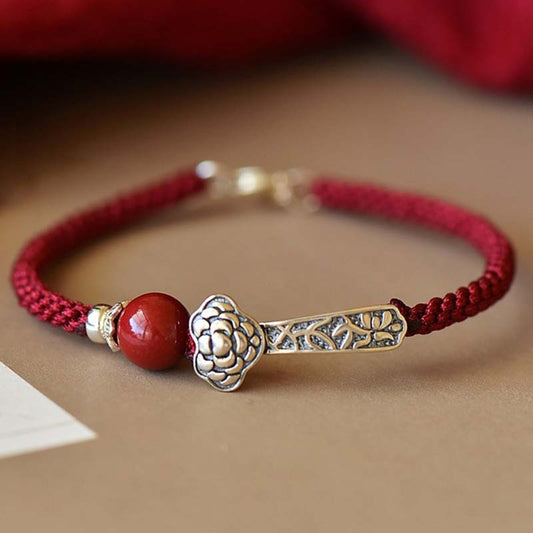 Pulsera de hilo bendecido con cinabrio y piedras de Buda en plata de ley 925