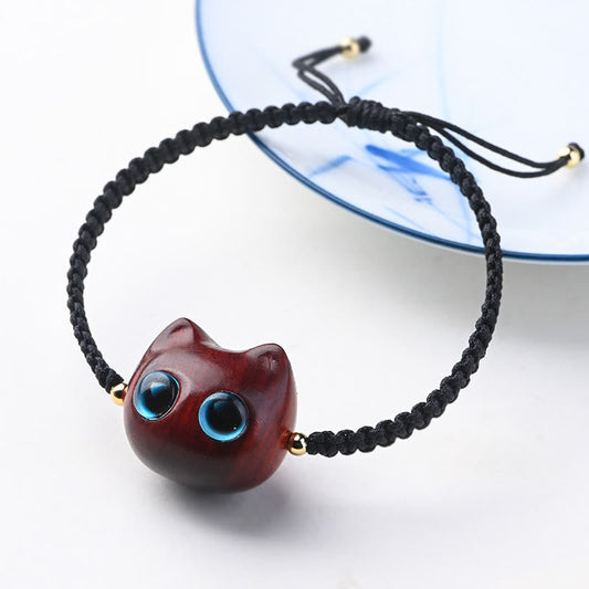 Pulsera trenzada con piedras de Buda, hoja pequeña, sándalo rojo, madera de ébano y cabeza de gato, protección y calma. 