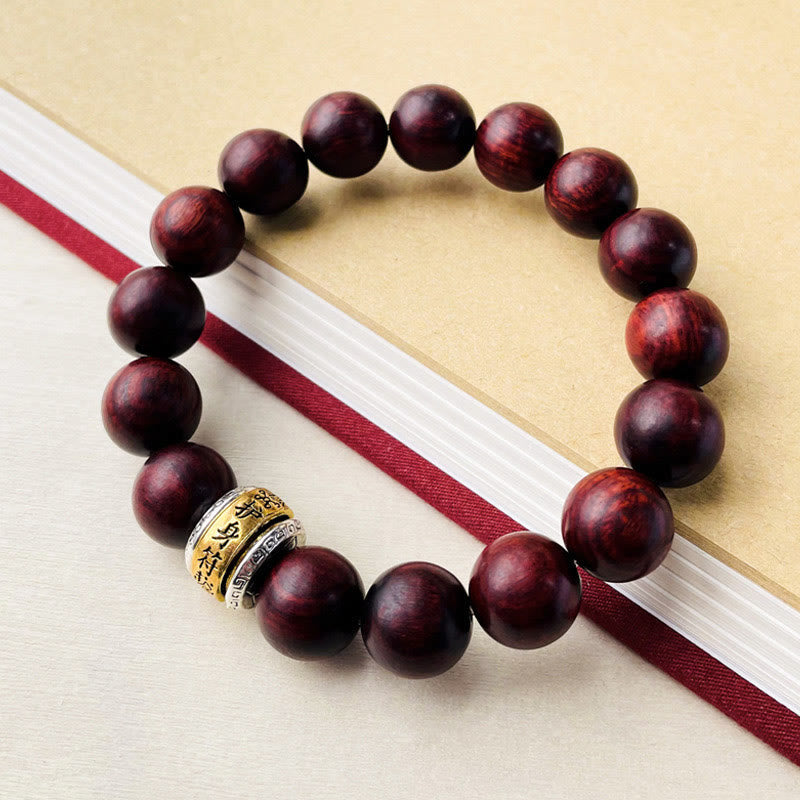 Pulsera protectora con amuleto de sándalo rojo y hojas pequeñas de Buda 