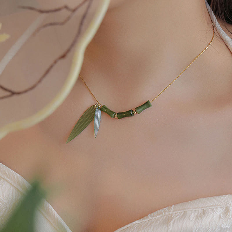 Collar con colgante de riqueza con diseño de hojas de bambú y jade y piedras de Buda