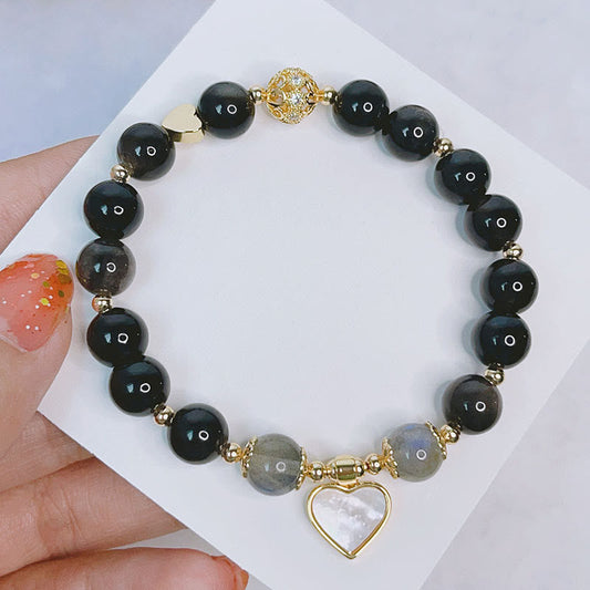 Pulsera de protección con obsidiana, corazón, estrella y flor de plata natural con piedras de Buda