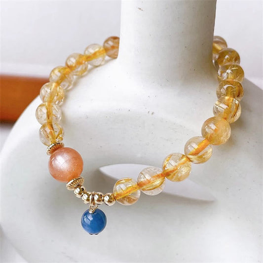 Pulsera de riqueza de cianita con piedra solar de cuarzo rutilado y oro natural de Buddha Stones