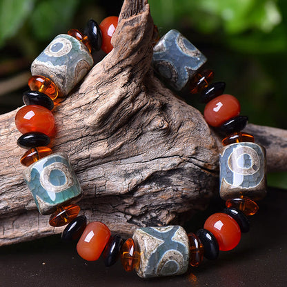 Buddha Stones Tibetisches Dreiäugiges Dzi-Perlen-Achat-Schutz-Glücksarmband