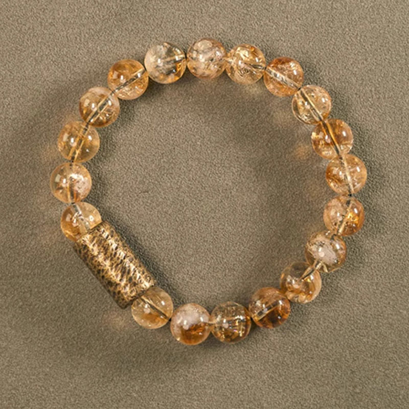 Pulsera protectora de cuentas de latón con cristales de citrino natural de Buddha Stones 