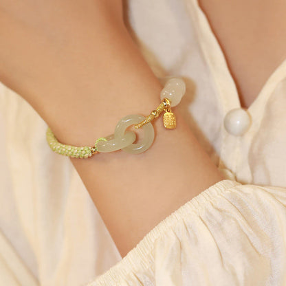 Pulsera trenzada con cuentas de jade hetiano natural de Buda y doble hebilla de paz con carácter Fu 