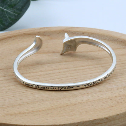 Brazalete de cobre con piedras de Buda y grabado de zorro